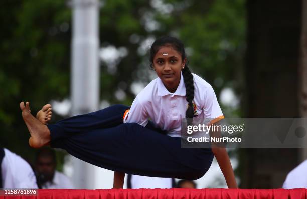 Girl performs yoga during an event to mark International Yoga Day at Independence Square, Colombo, Sri Lanka on 17 June 2023. International Yoga Day...