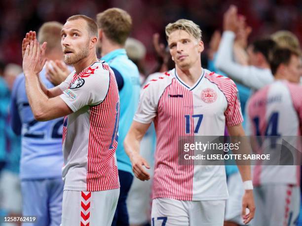 Denmark's midfielder Christian Eriksen reacst after winning the UEFA Euro 2024 group H qualification football match between Denmark and Northern...