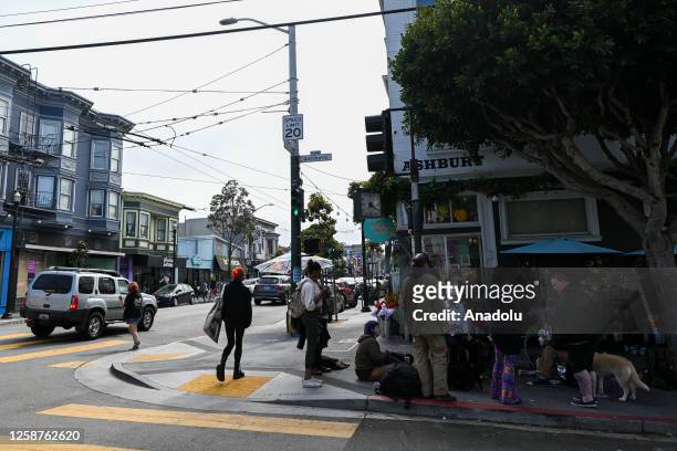People are seen in Haight and Ashbury neighborhood in San Francisco, California, United States on June 16, 2023. Haight-Ashbury named for the...