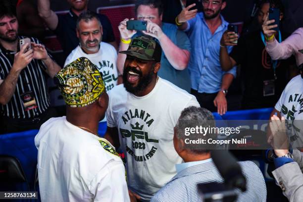Jon Jones has words with Francis Ngannou during PFL 2023 week 5 at OTE Arena on June 17, 2023 in Atlanta, Georgia.