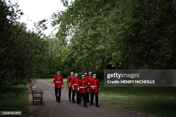 Guards of the Household Division arrive to take part in the King's Birthday Parade, 'Trooping the Colour', in London on June 17, 2023. The ceremony...