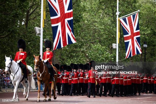 Coldstream Guards, a regiment of the Household Division Foot Guards, parade down The Mall during the King's Birthday Parade, 'Trooping the Colour',...