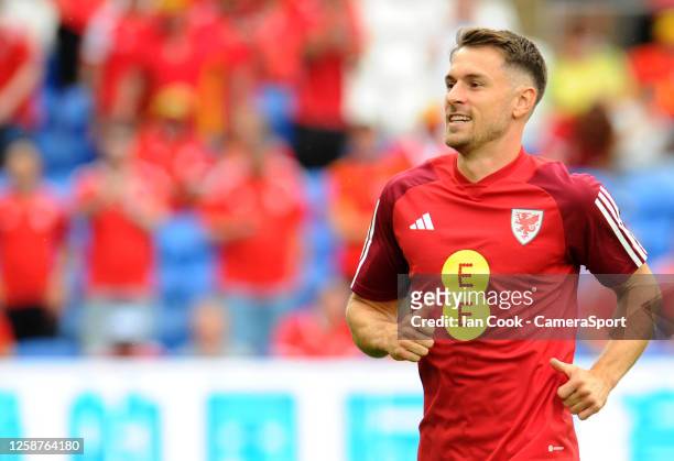 Wales' Aaron Ramsey during the pre-match warm-up during the UEFA EURO 2024 qualifying round group D match between Wales and Armenia at Cardiff City...