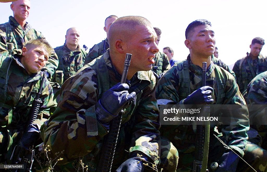 Marines Prostrate US Marines from the 2nd Battalion, 4th Marine Regiment, 1st Marine ...