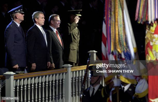 President George W. Bush , Chairman of the Joint Chiefs of Staff General Richard Myers , Secretary of Defense Donald Rumsfeld and the Vice Chairman...