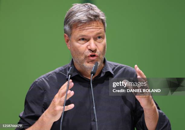 German Minister of Economics and Climate Protection Robert Habeck delivers a speech during a party rally of The Greens in Bad Vilbel near Frankfurt...