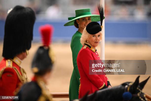Britain's Queen Camilla and Britain's Catherine, Princess of Wales attend the King's Birthday Parade, 'Trooping the Colour' on Horse Guards Parade,...