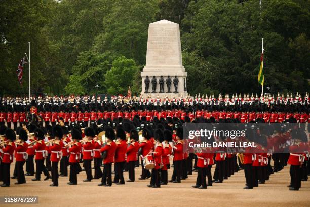 Members of the Household Division perform on Horse Guards Parade for the King's Birthday Parade, 'Trooping the Colour', in London on June 17, 2023....