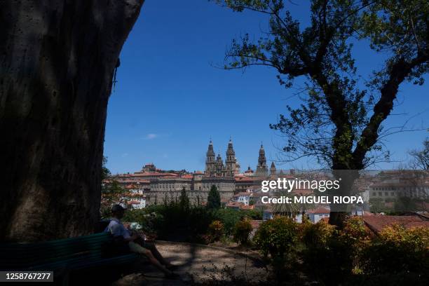 This photograph shows a view of the Cathedral of Santiago de Compostela from the Alameda park, on June 15, 2023. Santiago de Compostela is one of the...