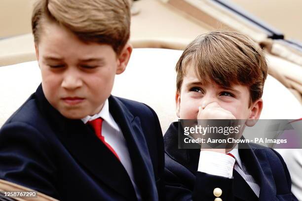 Prince George and Prince Louis during the Trooping the Colour ceremony at Horse Guards Parade, central London, as King Charles III celebrates his...