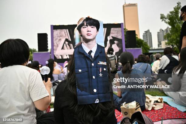 Fans of K-pop megastars BTS attend the "BTS 10th Anniversary FESTA @ Yeouido" in Seoul on June 17 to mark the 10th anniversary of the group's debut.