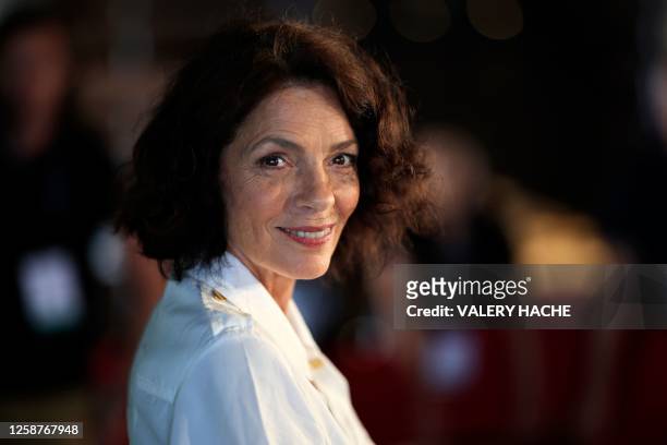 French actress Elisabeth Bourgine poses during a photocall for the TV series "Murders in Paradise", as part of the 62nd Monte-Carlo Television...