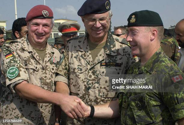 New commander of the Kabul Multinational brigade Canadian general Peter Devlin , International Secutiy Assisance Force Lieutenant General Norbert Van...
