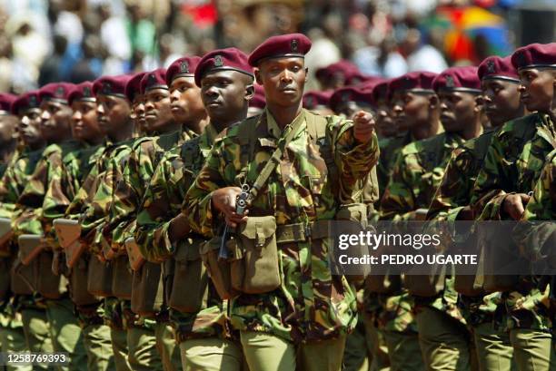 Kenyan soldiers march during the celebrations of Kenyatta Day in Nairobi 20 October 2002. Today Kenyans celebrate the independence heros. AFP...