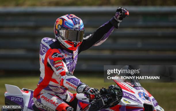 Ducati Pramac Racing Team's Spanish rider Jorge Martin celebrates after winning the Sprint race ahead of the MotoGP German motorcycle Grand Prix at...