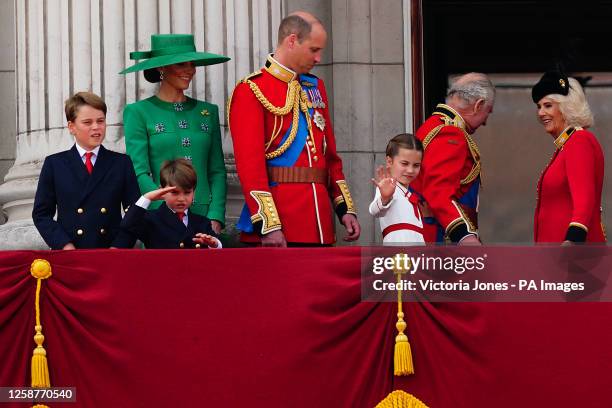 Prince George, Prince Louis, the Princess of Wales, the Prince of Wales, Princess Charlotte, King Charles III and Queen Camilla on the balcony of...