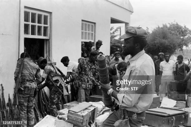 Fighters arrange weapons in the military training camp of Capolo, south of Silva Porto on January 28, 1976. After independence, Angola was the scene...