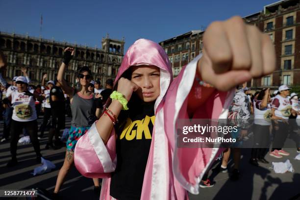 Woman during a Massive Boxing Class in Mexico City's Zocalo, organized by the government of the capital and the Instituto del Deporte.