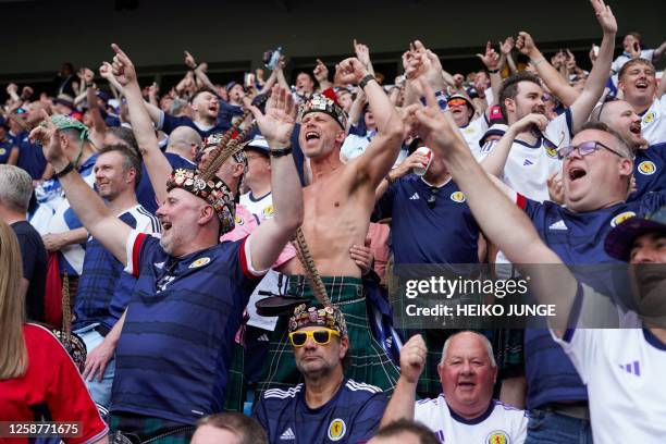 Supporters of Scotland cheer prior to the UEFA Euro 2024 group A qualification football match between Norway and Scotland in Oslo on June 17, 2023. /...