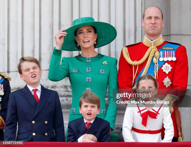 Prince George of Wales, Catherine, Princess of Wales, Prince Louis of Wales, Princess Charlotte of Wales and Prince William, Prince of Wales watch an...
