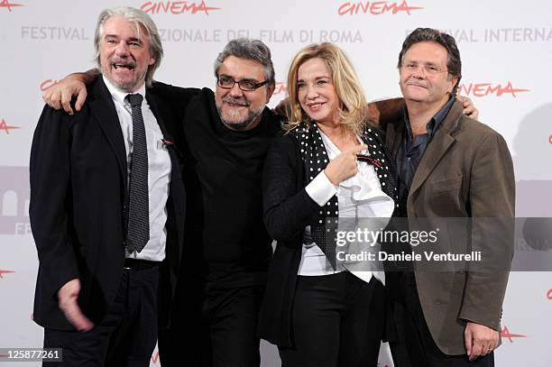 Filmmaker Ricky Tognazzi, screenwriters Giancarlo De Cataldo, Simona Izzo and Graziano Diana attend the "Il Padre E Lo Straniero" photocall during...