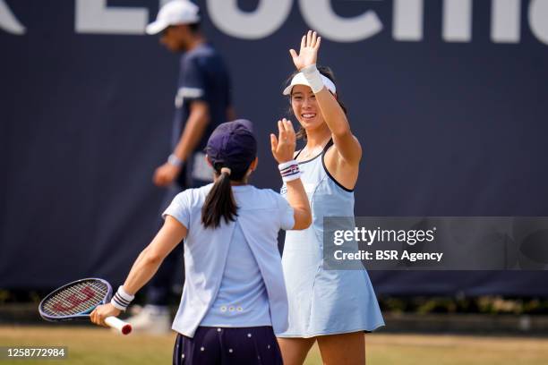 Shuko Aoyama of Japan and Ena Shibahara of Japan celebrate a point in their Women's Doubles Final against Viktoria Hruncakova of Slovakia and Tereza...