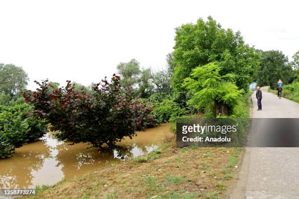 View of street flooded as a result of the overflowing river due to the heavy rain in Nis, Serbia on June 17, 2023. A state of emergency was declared...