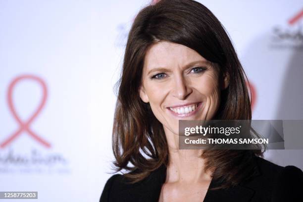 French TV host Magali Lunel poses on March 12, 2012 as she arrives at the Quai Branly Musuem in Paris, to attend the 18th edition of French...