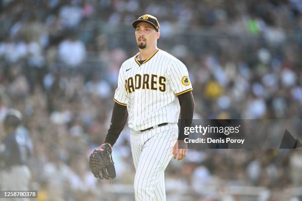 Blake Snell of the San Diego Padres walks off the field after pitching during the fifth inning of a baseball game against the Tampa Bay Rays on June...