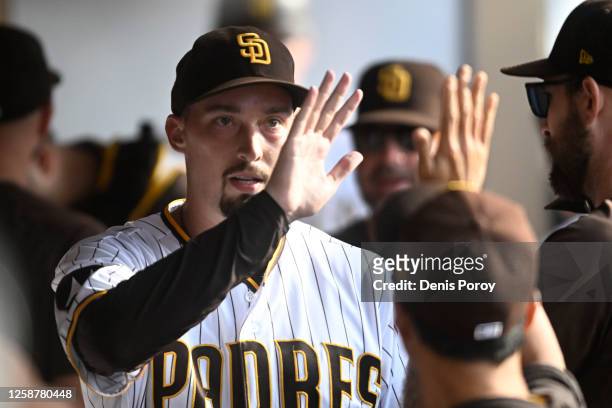 Blake Snell of the San Diego Padres is congratulated after pitching in the seventh inning of a baseball game against the Tampa Bay Rays June 17, 2023...