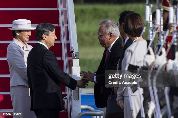 Japanese Emperor Naruhito accompanied by Empress Masako shakes hand Indonesian Minister Public Work and Public Housing Basuki Hadimuljono upon...