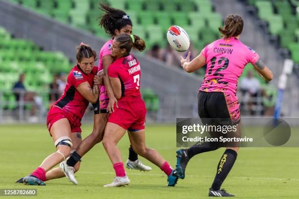 Southern Headliners player Magali Harvey gets hit by New York Locals player Saher Hamdan just as she passes the ball to Southern Headliners player...