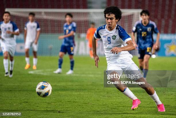 Amirbek Saidov of Uzbekistan seen in action during the AFC U-17 Asian Cup Group D match between Japan and Uzbekistan at Rajamangala National stadium....