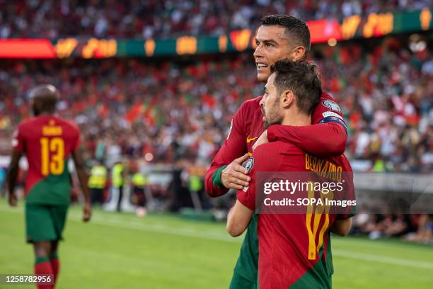 Cristiano Ronaldo and Bernardo Silva of Portugal celebrate a goal during the Euro 2024 qualifying match between Portugal and Bosnia Herzegovina at...