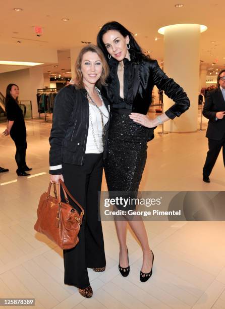Lisa Tant and designer L'Wren Scott attend a cocktail reception in her honour at The Room, The Bay on October 26, 2010 in Toronto, Canada.