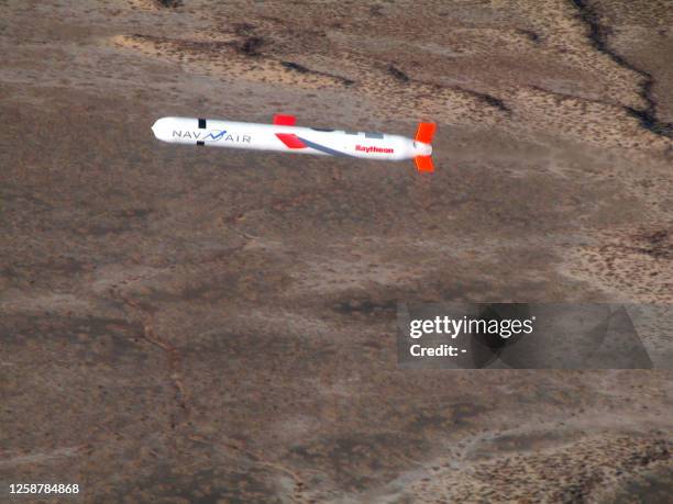 Tactical "Tomahawk" Block IV cruise missile, conducts a controlled flight test over the Naval Air Systems Command western test range complex in...
