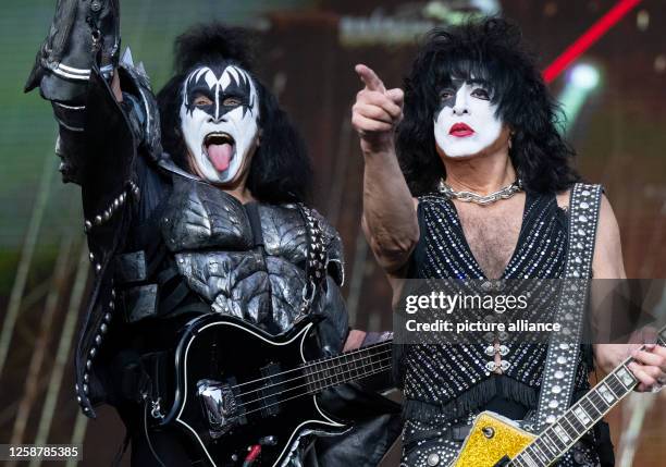 June 2023, Bavaria, Munich: Singer and bassist Gene Simmons and singer and guitarist Paul Stanley of the U.S. Band Kiss are on stage during a concert...