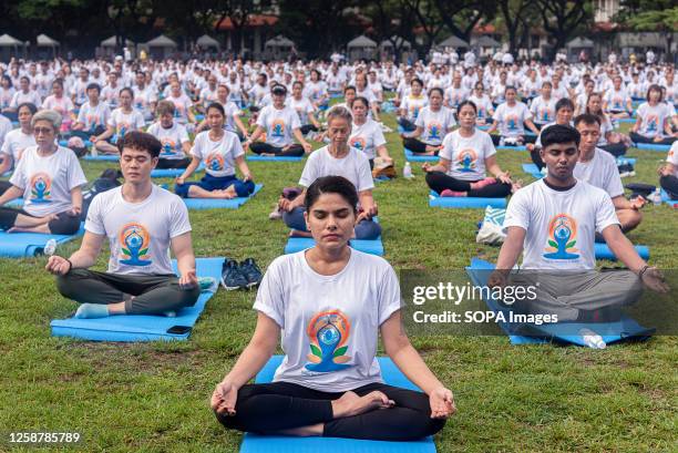 People participate in the Yoga practice event to mark the International Day of Yoga at Chulalongkorn University in Bangkok. The International Day of...