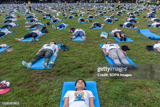 People participate in the Yoga practice event to mark the International Day of Yoga at Chulalongkorn University in Bangkok. The International Day of...