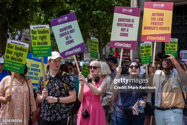 Campaigners from groups including the Women's Equality party, the Fawcett Society and the British Pregnancy Advisory Service protest outside the...