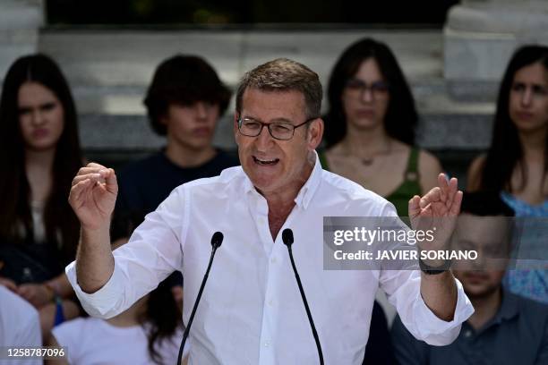 Partido Popular party's leader Alberto Nunez Feijoo delivers a speech during a pre-campaign rally in Madrid, on June 18 ahead of the July 23 early...