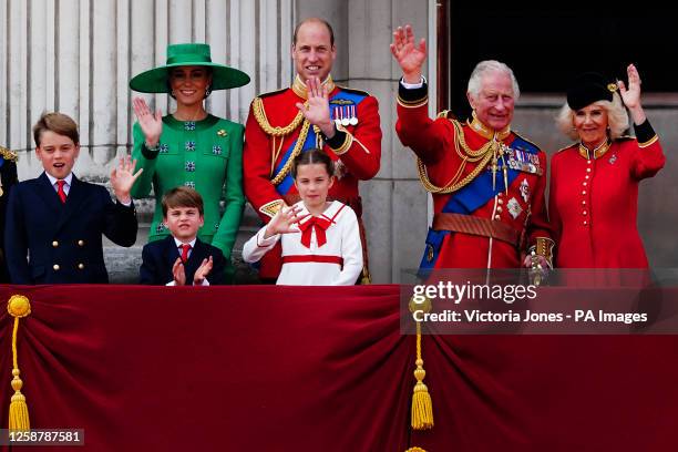 Prince George, the Princess of Wales, Prince Louis, the Prince of Wales, Princess Charlotte, King Charles III and Queen Camilla on the balcony of...