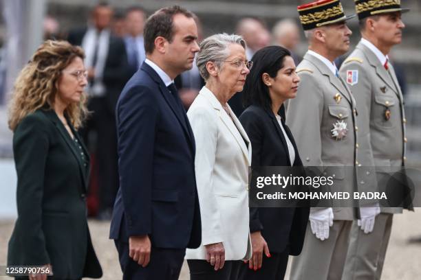 French Chief of the Defense Staff General Thierry Burkhard , French Secretary of State for Youth Sarah El Hairy , Prime Minister Elisabeth Borne and...