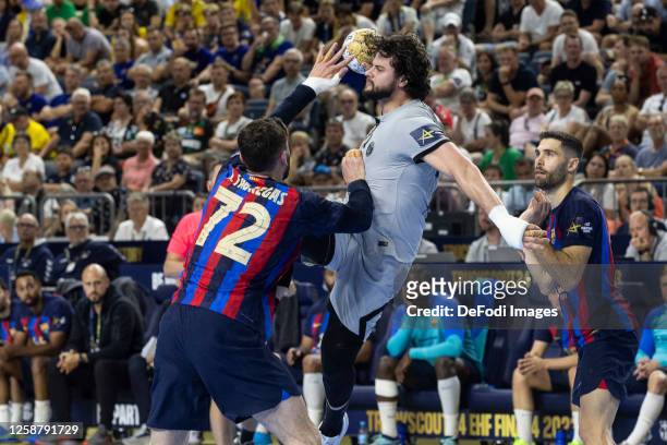 Ludovic Fabregas of FC Barcelona and Elohim Prandi of Paris Saint-Germain battle for the ball during the EHF FINAL4 Men Champions League bronze medal...