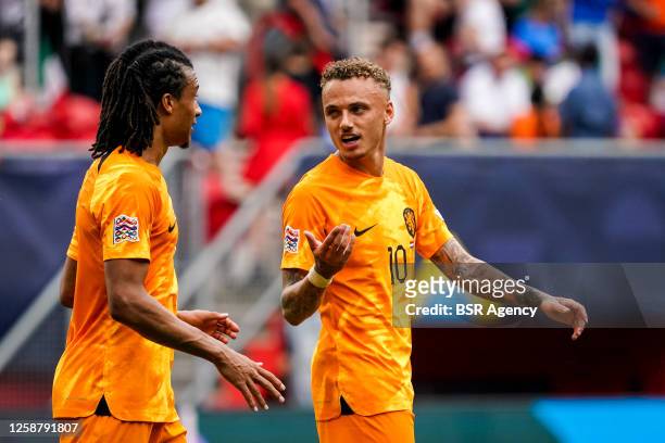 Nathan Ake of the Netherlands in discussion with Noa Lang of the Netherlands during the Netherlands v Italy - UEFA Nations League 2022/23 Third-place...