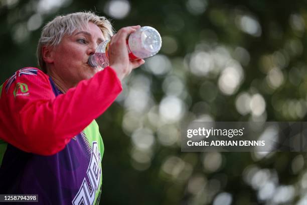 British BMX rider Sarah-Jane Nichols takes a drink of water during a training session at Andover BMX club in southern England on June 14, 2023. Known...