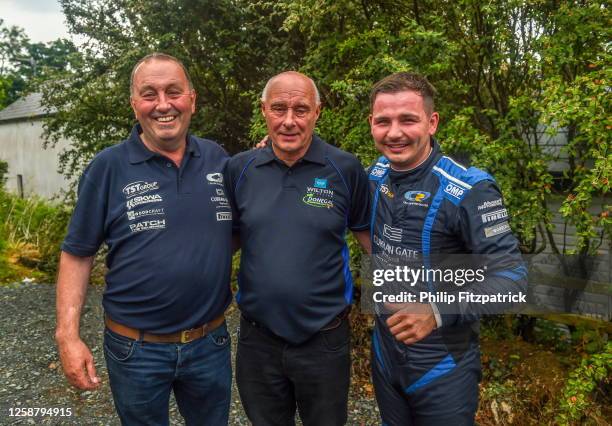 Donegal , Ireland - 18 June 2023; Callum Devine and his father Seamus with course clerk Eamon McGee after winning the Wilton Recycling Donegal...