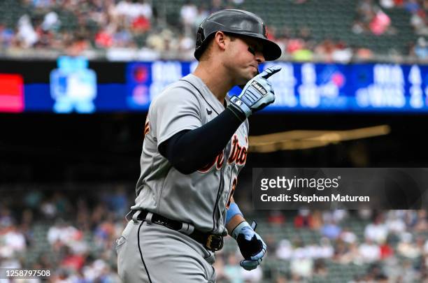Spencer Torkelson of the Detroit Tigers celebrates as he rounds the bases after hitting a two-run homerun in the fifth inning of the game against the...