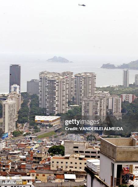 This 14 April 2004 taken from the Rocinha favela, a slum of more than 56,000 people in a tourist area in southern Rio de Janeiro, Brazil, shows a...