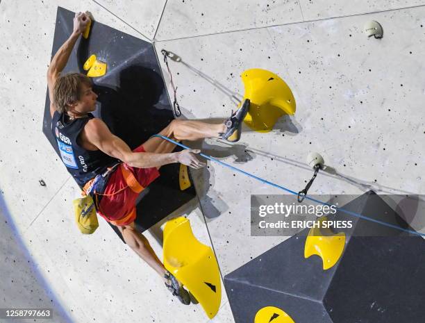 Alexander Megos of Germany competes during the final of men Lead competition for the IFSC Climbing World Cup in Innsbruck, Austria, June 18, 2023. /...